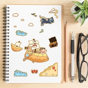 Cartoon cat travel stickers set for DIY journals on a desk with aesthetic props