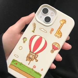 Close-up of beige matte phone case with cartoon giraffe and hot air balloon illustration