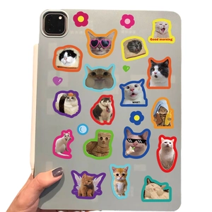 Clear tablet case with cute cartoon cat stickers and magnetic stylus holder display
