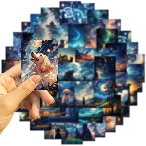Close-up of waterproof Van Gogh style dog stickers for laptop and guitar decoration