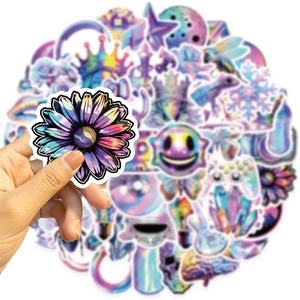 Detail of laser holographic stickers with floral and crown patterns in colorful finish