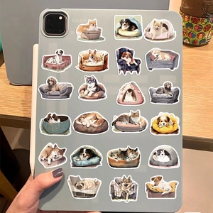 Detail of waterproof cartoon pet stickers on a blue tablet case with various cat and dog designs