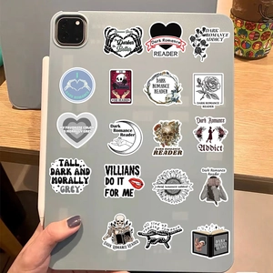 Waterproof Dark Romance stickers on iPad showing skulls and roses literary aesthetic