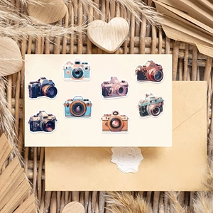 Macro detail of retro camera stickers on vintage envelope with dried flowers and wax seal