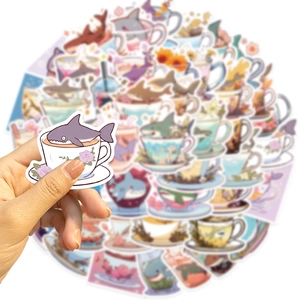 Close-up of waterproof shark teacup stickers featuring colorful cartoon designs for DIY decor