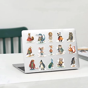 Detailed view of 15 unique cartoon animal stickers on a silver laptop lid