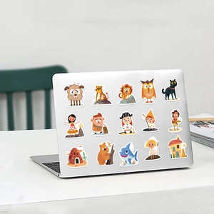 Cartoon prehistoric stickers on laptop featuring animals and hand-drawn characters