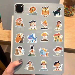 Waterproof cartoon graffiti stickers featuring animals and characters on a tablet