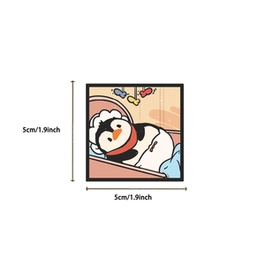 5cm waterproof penguin sticker showing a cute cartoon penguin sleeping in a cozy cradle