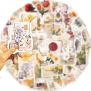 Detailed view of vintage floral stickers with aesthetic pastel colors and retro paper texture