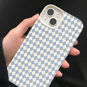 Detail of light blue and cream checkerboard phone case held against dark knit background