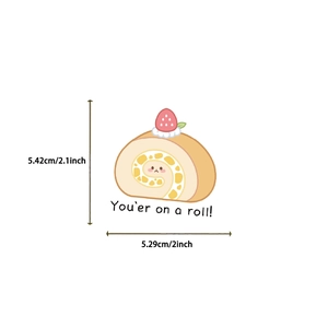 Detail of cute cake roll sticker with You're on a roll text and 2.1 inch size mark