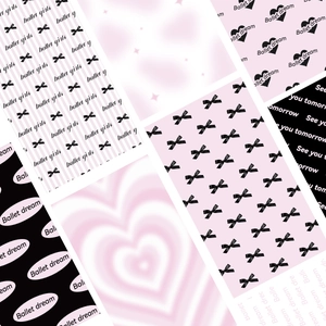 Close-up of Coquette style DIY phone stickers with pink bows and ballet motifs