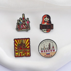 Set of 4 Russian Moscow souvenir enamel pins featuring Matryoshka and architecture