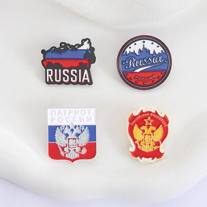 Set of four Russia theme enamel pins featuring national flag colors and double-headed eagle
