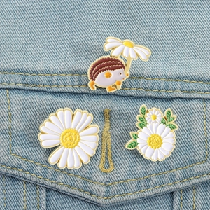 Charming hedgehog with daisy umbrella enamel pin set on denim jacket pocket