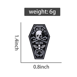 Coffin enamel pin with Memento Mori skull and wings, product size 1.4x0.8 inches