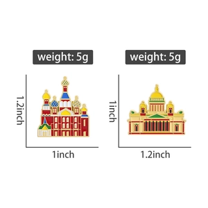 Detail of two colorful Russian landmark enamel brooches with gold finish and size markings