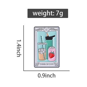 Three of Cups tarot enamel pin featuring beverage designs with 1.4x0.9 inch dimensions