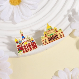 Russian architectural enamel pins featuring Saint Basil's Cathedral and colorful buildings