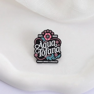 Aqua Tofana vintage enamel pin with floral details on minimalist white background