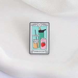 Detail of Three of Cups tarot enamel pin featuring creative juice and coffee drink designs