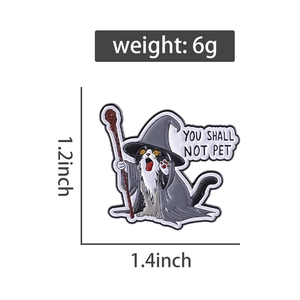 Detail view of tuxedo cat wizard enamel pin with dimensions 1.2x1.4 inches and weight 6g