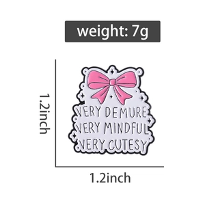 Detail showing the 1.2 inch pink bow enamel pin with dimensions and weight data