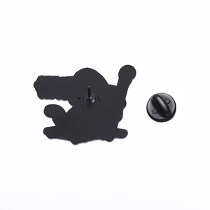 Close-up of the cat wizard enamel pin back with black metal plating and rubber clutch