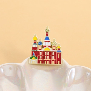 Detailed close-up of Saint Basil's Cathedral enamel badge with colorful dome details