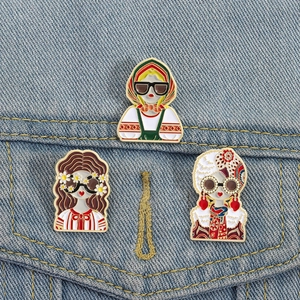 Three colorful Russian fashion style enamel pins set on blue denim fabric background