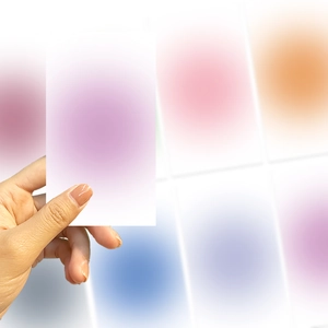 Close-up of decorative DIY phone back cards featuring soft gradient colorful circles