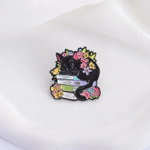 Cute black cat sleeping on books enamel brooch pin with colorful flowers for women