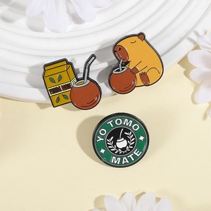 Three-piece Yerba Mate enamel pin set featuring Capybara and Mate tea designs