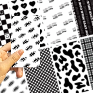 Detail of minimalist black and white decorative phone stickers with lovely letter patterns
