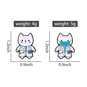 Detail showing two cute white cat doctor enamel pins with stethoscopes and masks