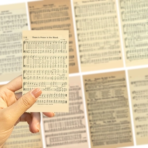 Detail of vintage sheet music sticker with aged paper texture for DIY phone decor