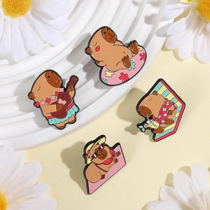 Set of four cute capybara enamel pins featuring summer vacation scenes on white background