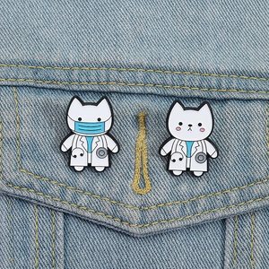 Cartoon white cat doctor enamel pins with stethoscope on denim jacket pocket
