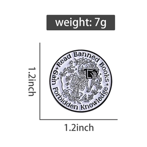Detail of round enamel pin with reading skeleton and Read Banned Books slogan