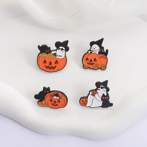Set of four cartoon Halloween enamel pins featuring ghosts, black cats, and pumpkins