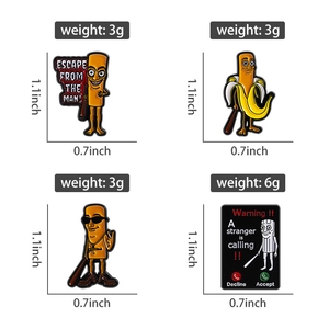 Detail view of four funny cartoon enamel pins with banana man and slogan designs