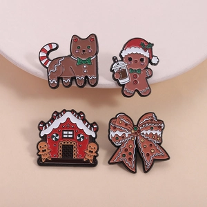 Set di 4 spille natalizie in smalto con omino di pan di zenzero, gatto e casa decorativa
