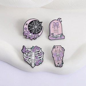 Gothic Halloween 4-piece pin set with lavender skull, moon, coffin and rib cage pins