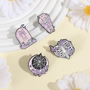 Pastel goth enamel pins set with purple skull and dead cute tombstone designs