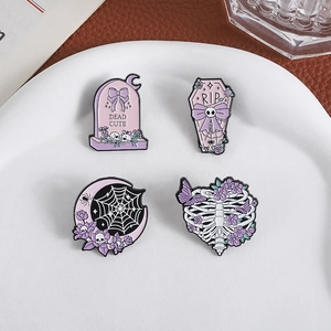 Gothic Halloween enamel pins set featuring skeleton, coffin, and tombstone designs