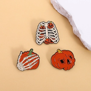 Halloween enamel pins set featuring spooky skull and pumpkin designs in gothic style