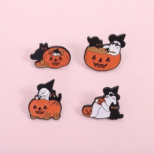 Set of four cute Halloween enamel pins featuring ghost, black cat, and pumpkin designs