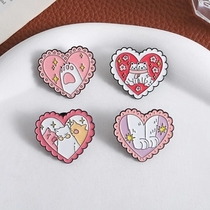 Set of 4 cute heart-shaped cat enamel pins with pink bows and feline paw illustrations