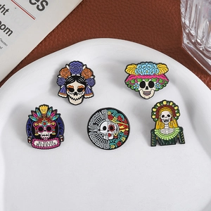 5pcs Halloween Día de Muertos skull enamel pins with colorful floral details on white tray